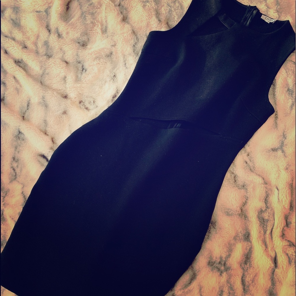 Black fitted dress with cutouts